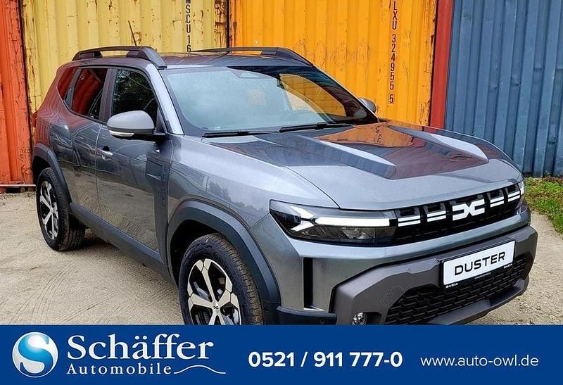 Dolomitgrau metallic dolomitgrau metallic Neu 2025 Dacia Duster Journey SUV | 24.990 € (Fairer Preis) - Bild 1/4