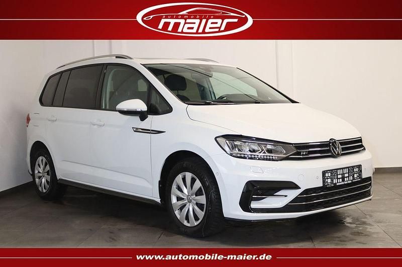 Pure white Gebraucht 2023 VW Touran R-line Van / Kleinbus | 33.400 € (Fairer Preis) - Bild 1/4
