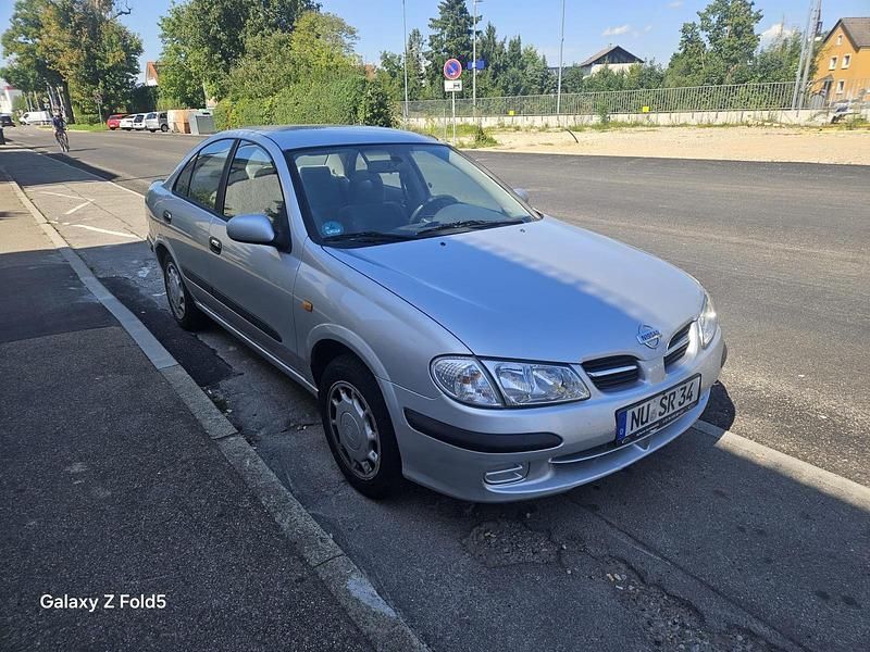 Grau Gebraucht 2000 Nissan Almera Limousine | 2.400 € - Bild 1/4