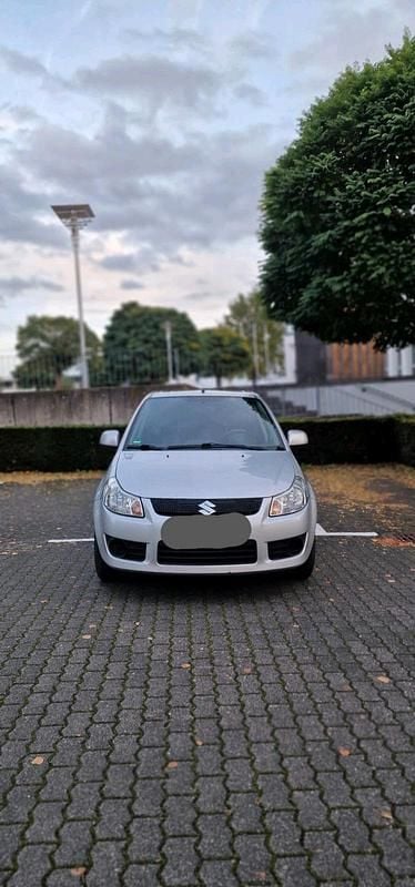 Silber Gebraucht 2007 Suzuki SX4 SUV | 2.100 € (Fairer Preis) - Bild 1/4