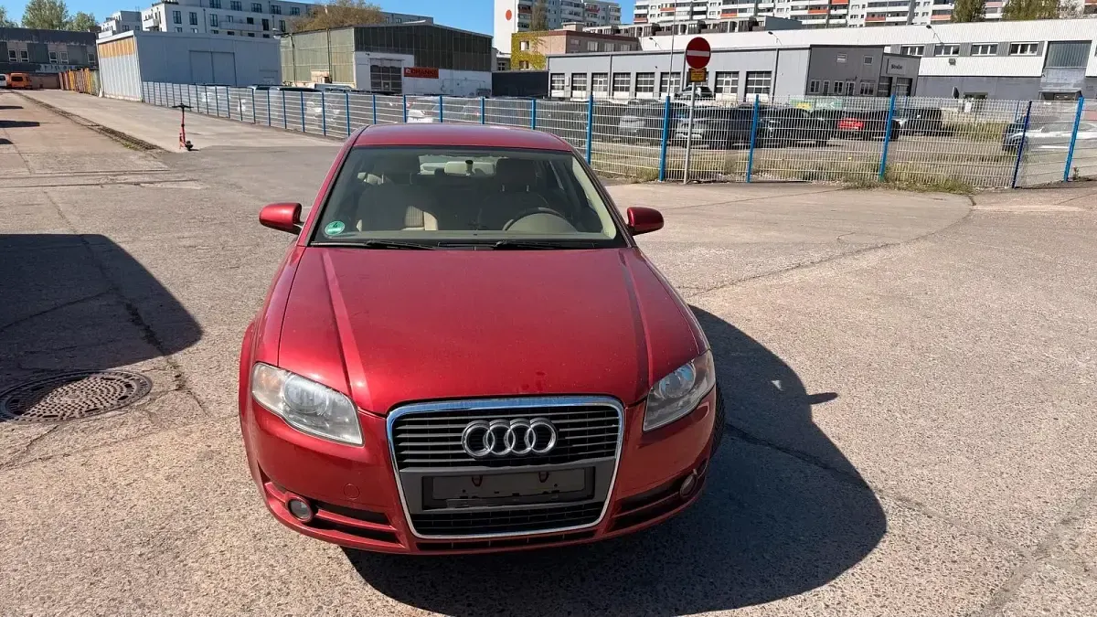 Używany Audi A4 130 KM (95 kW) 2006 Czerwony Sedan/Limuzyna
