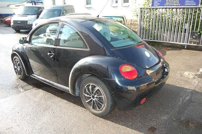 Gebraucht VW New Beetle 75 PS (55 kW) 2002 Schwarz Kleinwagen
