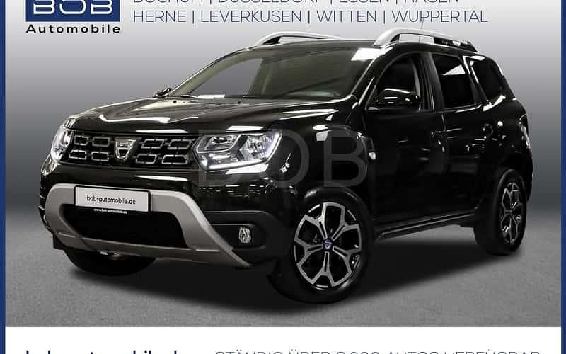 Perlmuttschwarz met (schwarz) (schwarz) Gebraucht 2021 Dacia Duster Celebration SUV | 17.333 € (Fairer Preis) - Bild 1/4