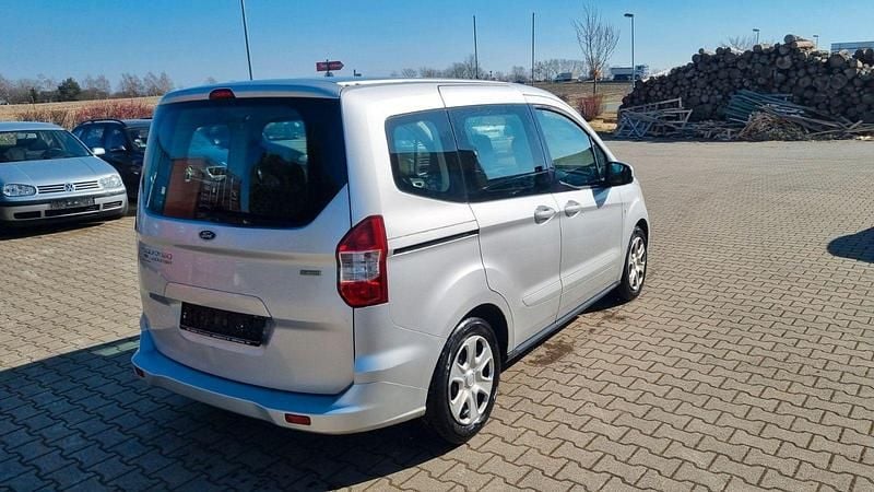 Gebraucht Ford Tourneo Courier Trend 101 PS (74 kW) 2016 Silber Van / Kleinbus