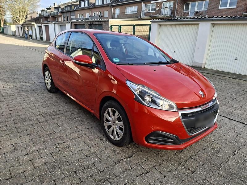 Gebraucht Peugeot 208 85 PS (62 kW) 2016 Orange Kleinwagen