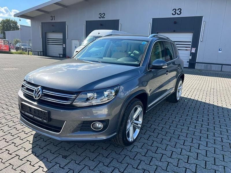 Grau Gebraucht 2015 VW Tiguan Sportline SUV | 11.690 € (Superpreis) - Bild 1/4