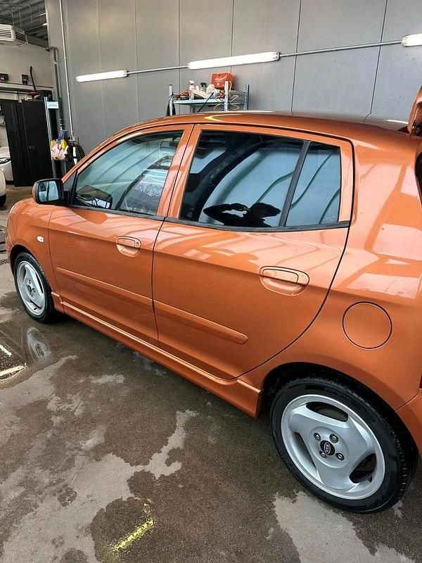 Używany Kia Picanto EX 65 KM (47 kW) 2004 Pomarańczowy Hatchback