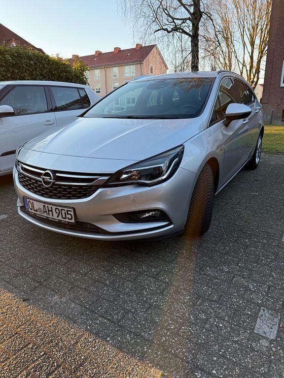 Silber Gebraucht 2017 Opel Astra Dynamic Kombi | 8.499 € (Fairer Preis) - Bild 1/4