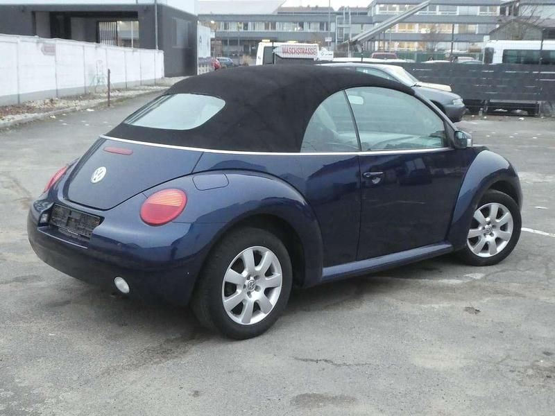 Gebraucht VW New Beetle Cabriolet 75 PS (55 kW) 2003 Royal navy perleffekt Cabrio