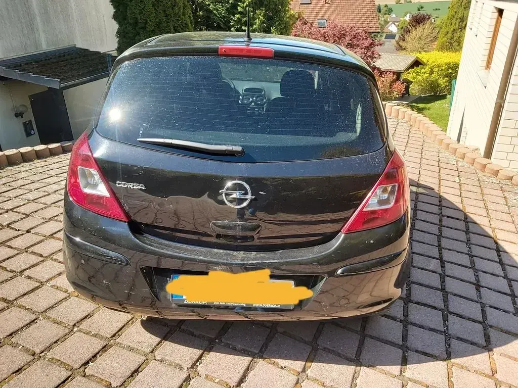 Używany Opel Corsa Selection 87 KM (63 kW) 2010 Czarny Hatchback