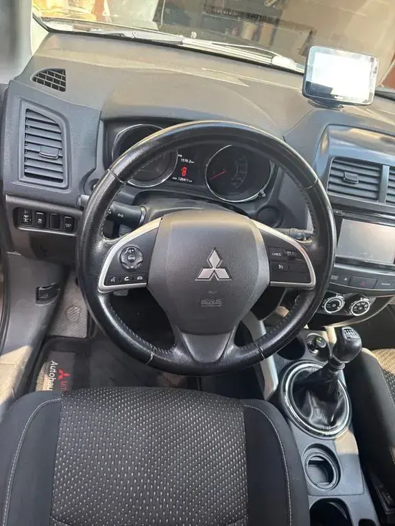 Gebraucht Mitsubishi ASX Invite 150 PS (110 kW) 2014 Braun SUV