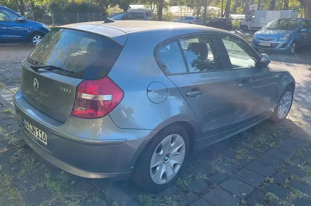 Używany BMW 116 122 KM (89 kW) 2011 Szary Hatchback