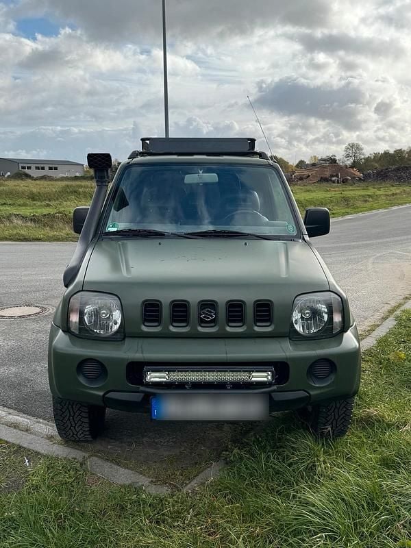 Grün Gebraucht 1999 Suzuki Jimny SUV | 6.650 € - Bild 1/4
