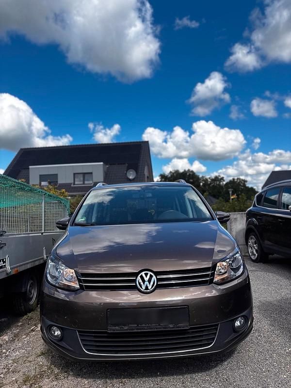 Braun Gebraucht 2014 VW Touran Van / Kleinbus | 5.750 € - Bild 1/4