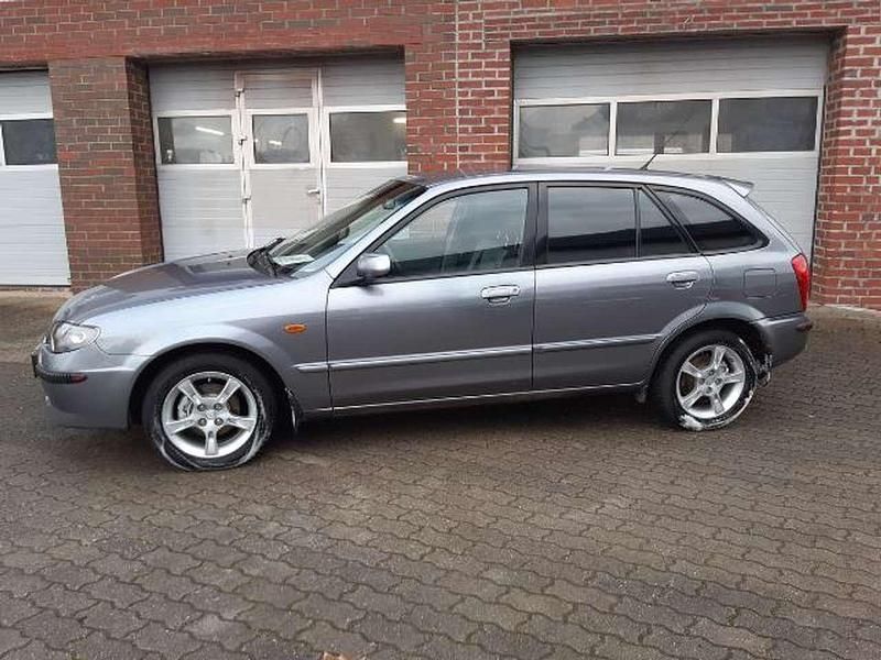 Gebraucht Mazda 323 98 PS (72 kW) 2003 Titaniumgrey metallic (25g) Limousine