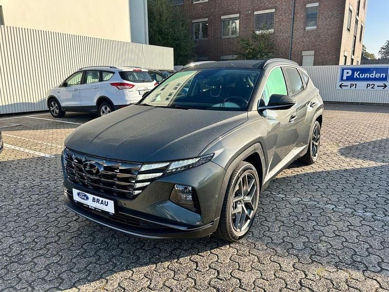 Grau Gebraucht 2021 Hyundai Tucson Prime SUV | 25.490 € (Etwas zu teuer) - Bild 1/4