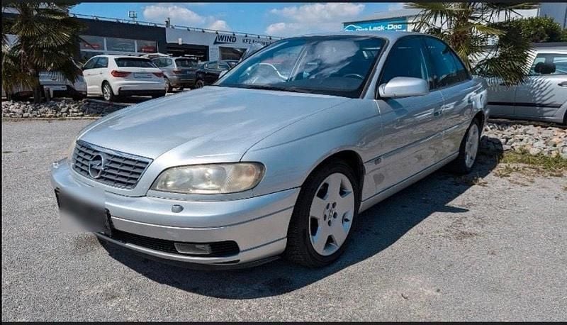 Second-hand Opel Omega 179 CP (131 kW) 2002 Argintiu Berlinǎ