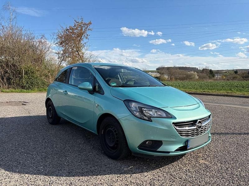 Second-hand Opel Corsa drive 90 CP (66 kW) 2015 Verde Hatchback
