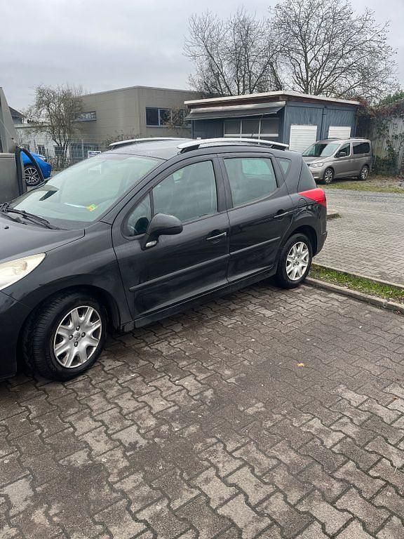 Gebraucht Peugeot 207 Premium 95 PS (69 kW) 2011 Schwarz Kombi