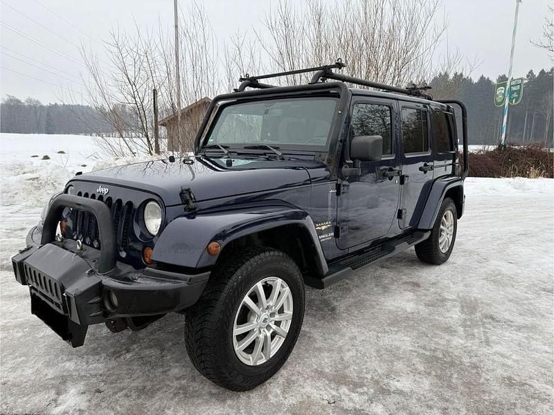 Blau Gebraucht 2012 Jeep Wrangler Unlimited Sahara SUV | 16.400 € (Guter Preis) - Bild 1/4