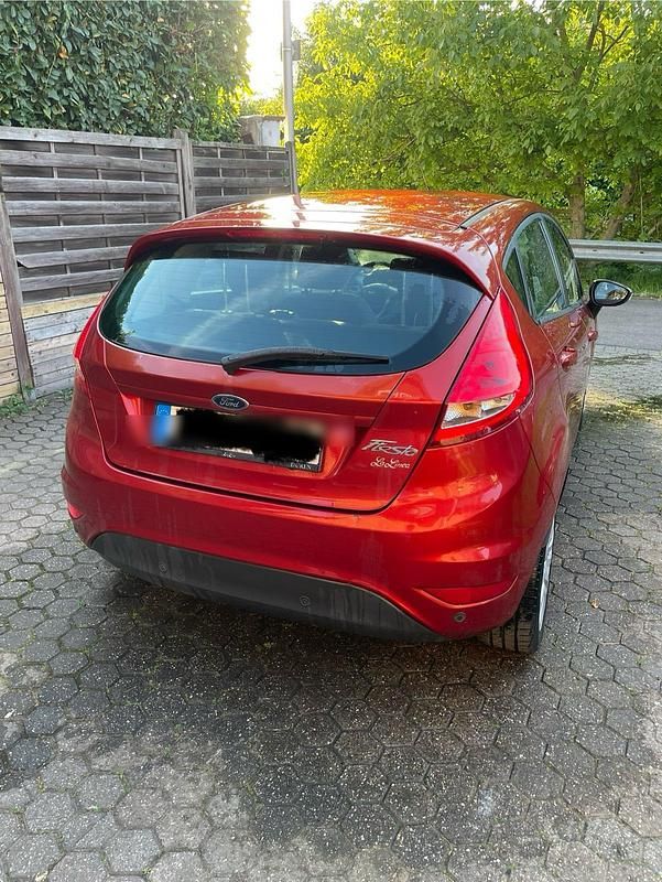 Orange Gebraucht 2009 Ford Fiesta Kleinwagen | 3.100 € (Guter Preis) - Bild 1/4
