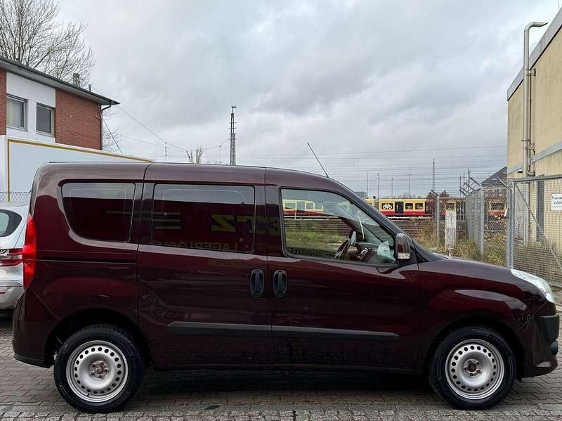 Gebraucht Fiat Doblò Dynamic 90 PS (66 kW) 2010 Orange  rot Van / Kleinbus