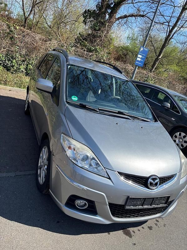 Grau Gebraucht 2010 Mazda 5 Van / Kleinbus | 2.299 € (Fairer Preis) - Bild 1/4