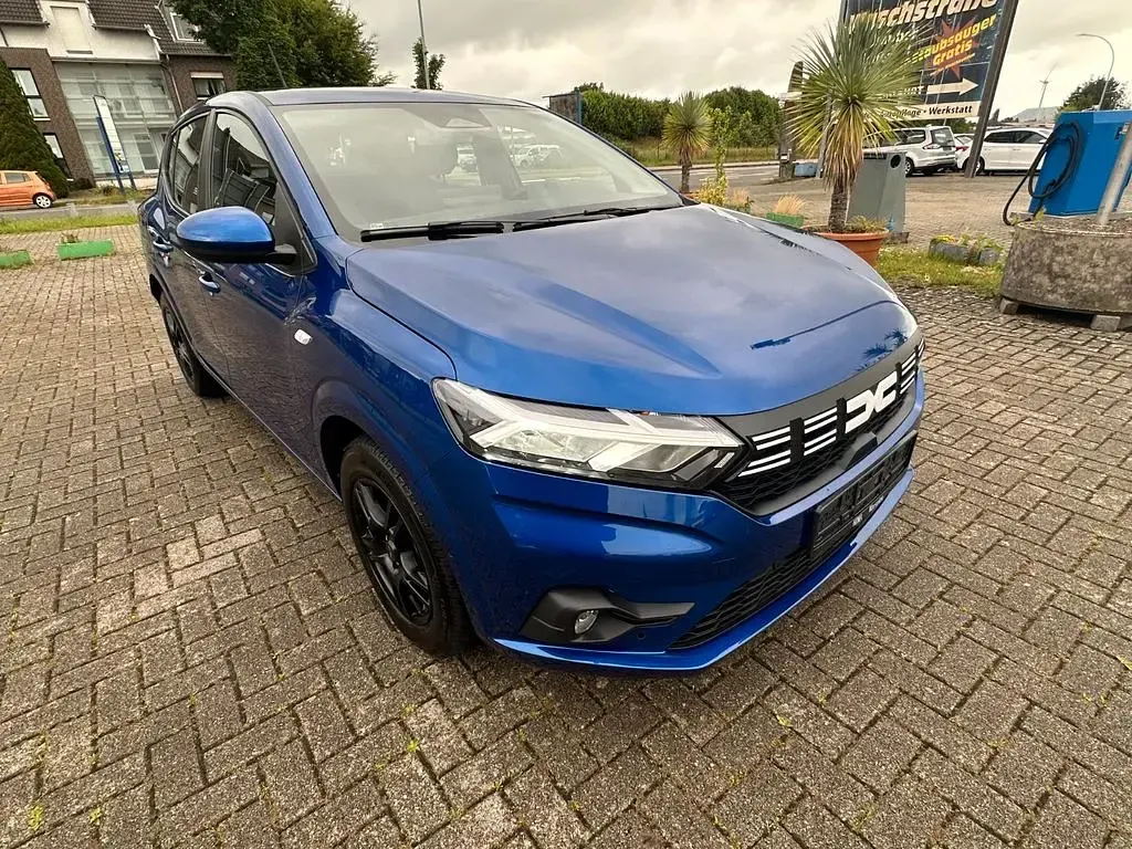 Gebraucht Dacia Sandero Expression 91 PS (66 kW) 2024 Blau Limousine