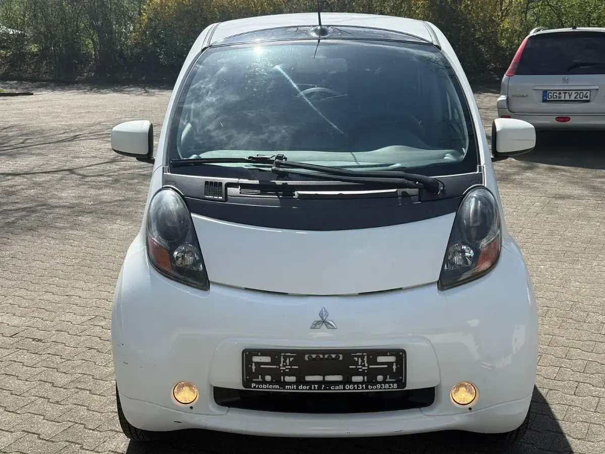 Gebraucht Mitsubishi i-MiEV Basis 49 kW (67 PS) 2013 Weiß Kleinwagen