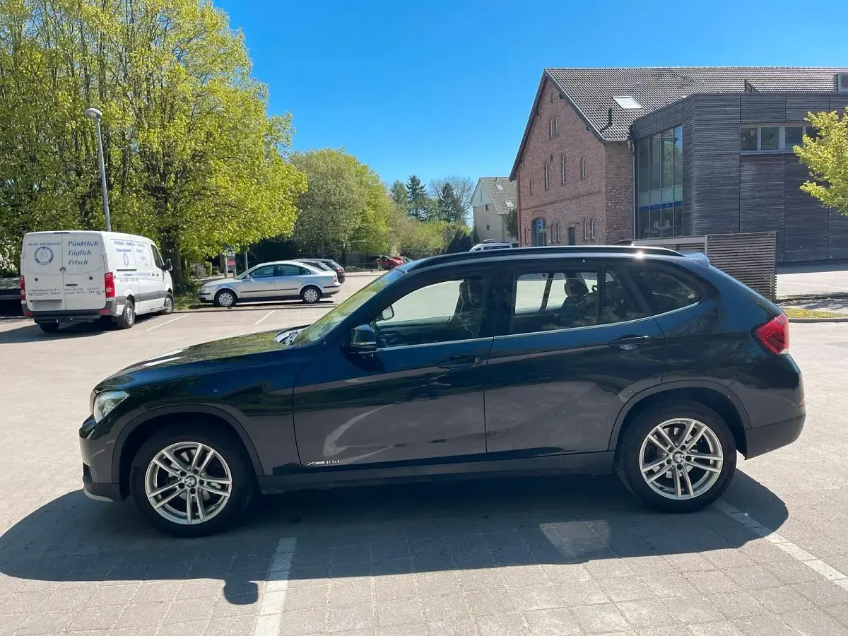 Second-hand BMW X1 143 CP (105 kW) 2014 Negru SUV