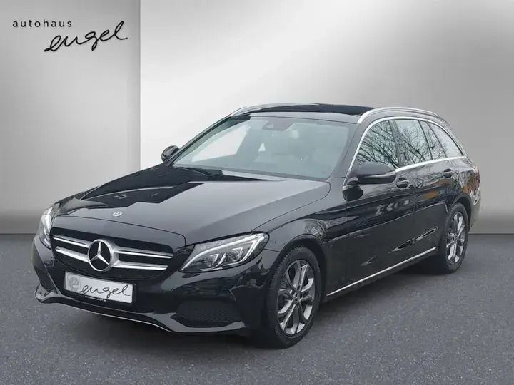 Obsidian black metallic paint Gebraucht 2018 Mercedes C200 Avantgarde Kombi | 21.889 € (Guter Preis) - Bild 1/4