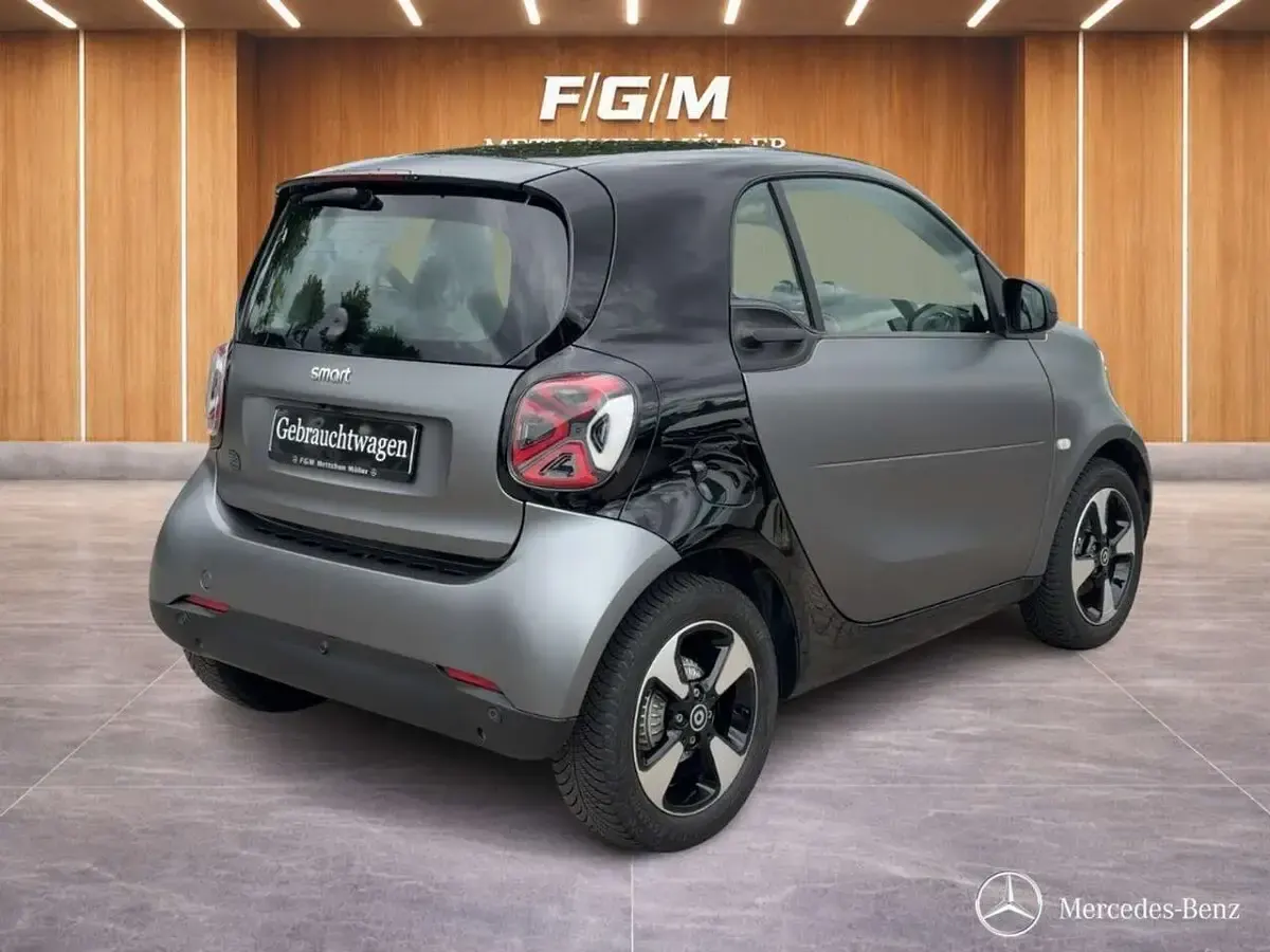 Gebraucht Smart ForTwo Coupé 60 kW (82 PS) 2024 Bodypanels in titania grey (ma Kleinwagen