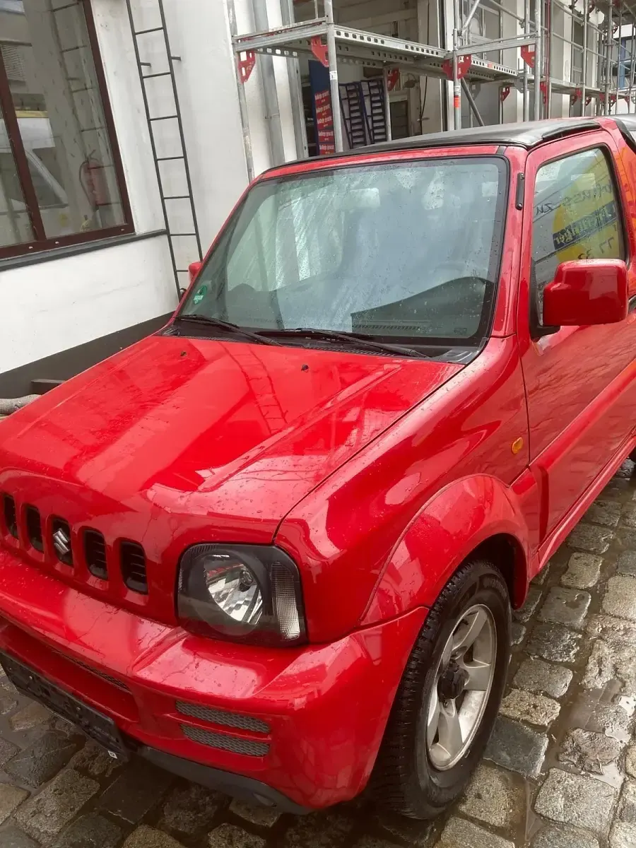 Używany Suzuki Jimny 86 KM (63 kW) 2009 Czerwony SUV