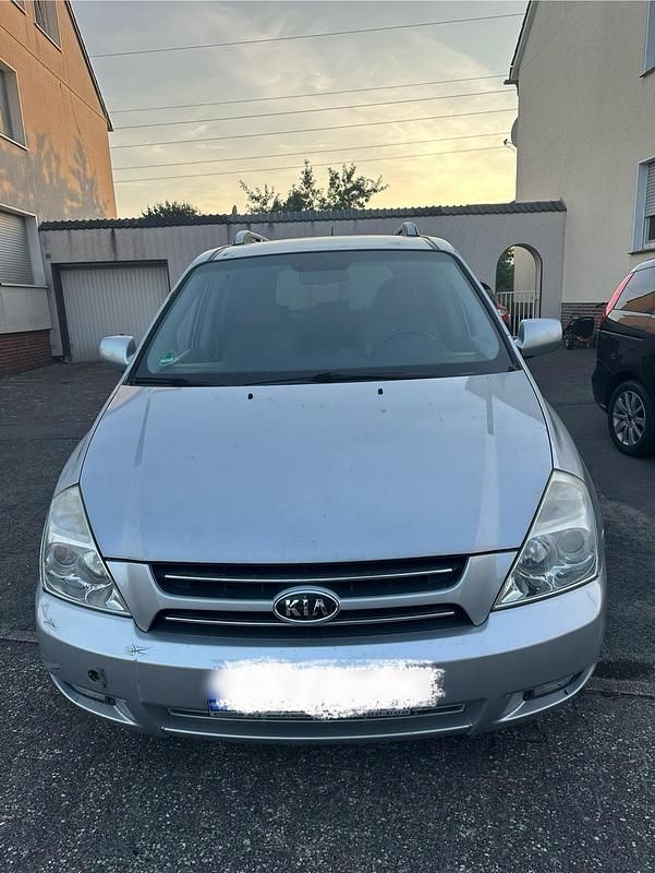 Grau Gebraucht 2009 Kia Carnival Van / Kleinbus | 1.000 € - Bild 1/4
