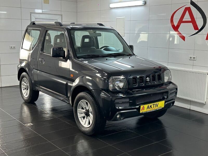 Schwarz Gebraucht 2012 Suzuki Jimny Style SUV | 8.900 € (Fairer Preis) - Bild 1/4