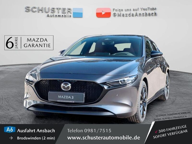 Grau Gebraucht 2024 Mazda 3 Nagisa Limousine | 30.280 € (Etwas zu teuer) - Bild 1/4