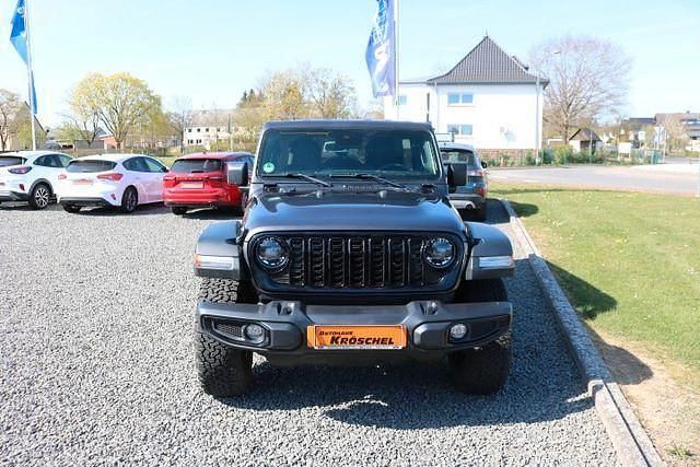 Grau Gebraucht 2024 Jeep Wrangler SUV | 74.990 € (Fairer Preis) - Bild 1/4