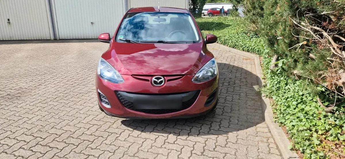 Gebraucht Mazda 2 75 PS (55 kW) 2012 Rot Kleinwagen