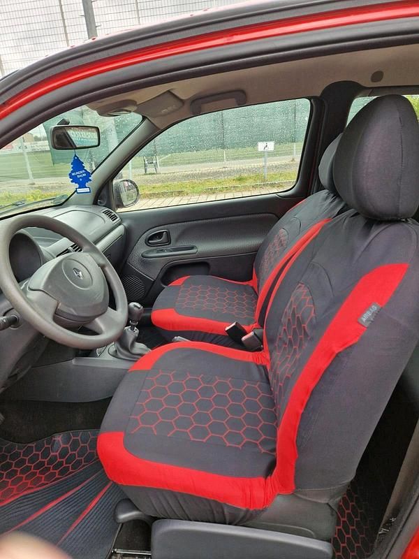 Second-hand Renault Clio II 55 CP (40 kW) 2011 Roșu Hatchback