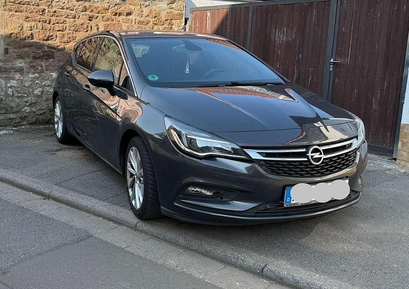 Grau Gebraucht 2016 Opel Astra Dynamic Kleinwagen | 7.400 € (Fairer Preis) - Bild 1/4