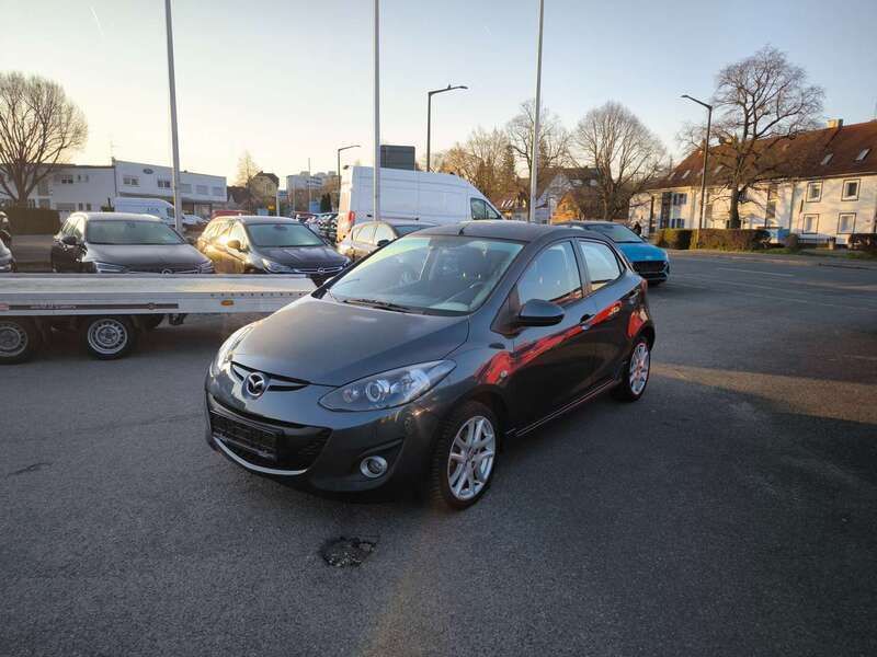 Kronosgrau metallic Gebraucht 2012 Mazda 2 Inclusive Kleinwagen | 7.400 € (Fairer Preis) - Bild 1/4
