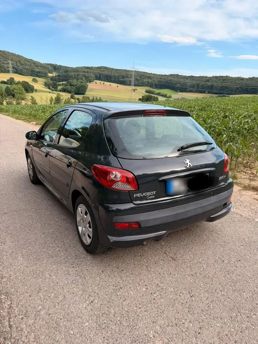 Gebraucht Peugeot 206+ 75 PS (55 kW) 2009 Schwarz Kleinwagen