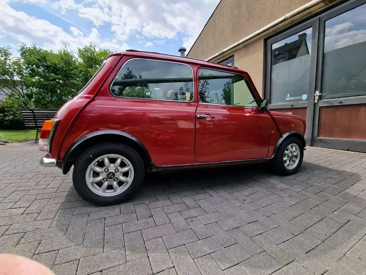 Second-hand Rover Mini 53 CP (38 kW) 1996 Roșu Berlinǎ