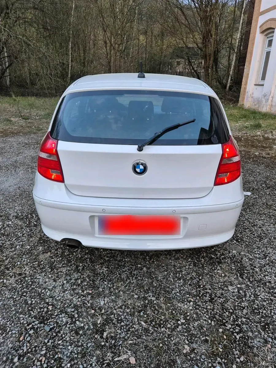 Używany BMW 116 122 KM (89 kW) 2008 Biały Hatchback