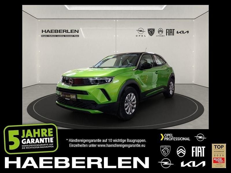 Gebraucht Opel Mokka-e Edition 100 kW (136 PS) 2022 Matcha green/ikone gruen (metallic) SUV