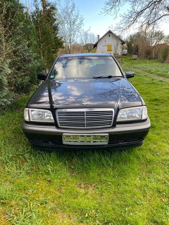 Second-hand Mercedes C180 Classic 122 CP (89 kW) 1998 Negru Berlinǎ
