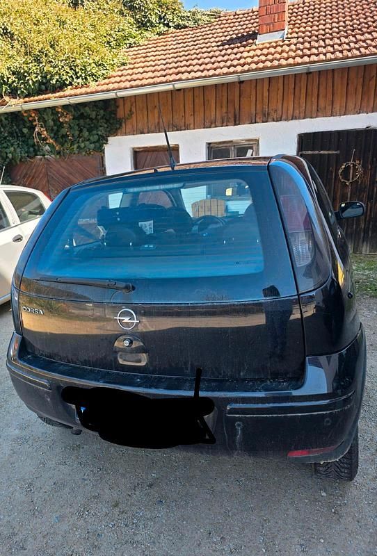 Second-hand Opel Corsa 60 CP (44 kW) 2005 Negru Hatchback