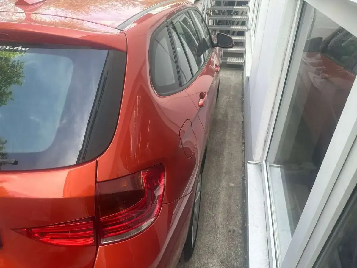 Gebraucht BMW X1 150 PS (110 kW) 2014 Valencia orange SUV