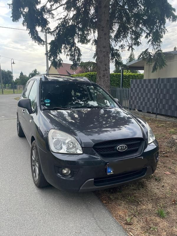 Grau Gebraucht 2006 Kia Carens Van / Kleinbus | 2.499 € - Bild 1/4