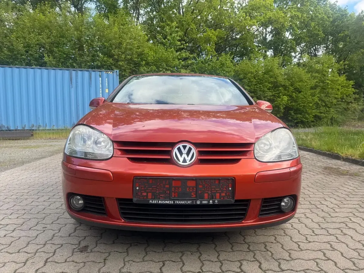 Używany VW Golf Goal 80 KM (58 kW) 2006 Pomarańczowy Coupe